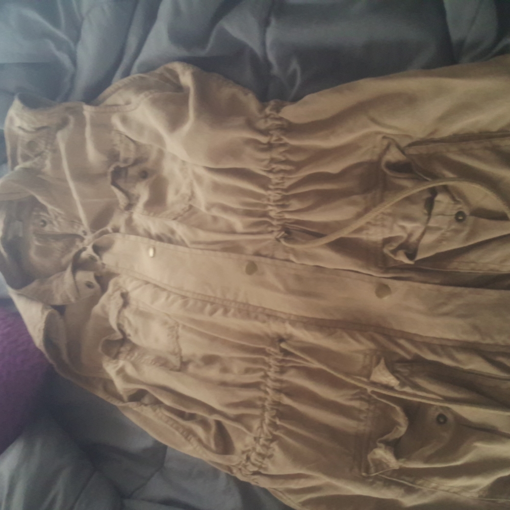 Tan sleeveless vest